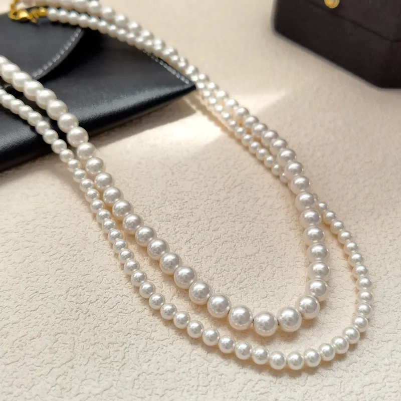 Collier de perles simulées en verre pour femme et fille, bijoux modernes, élégant, tempérament, perles de couleur grise et blanche brillantes_voghion.com