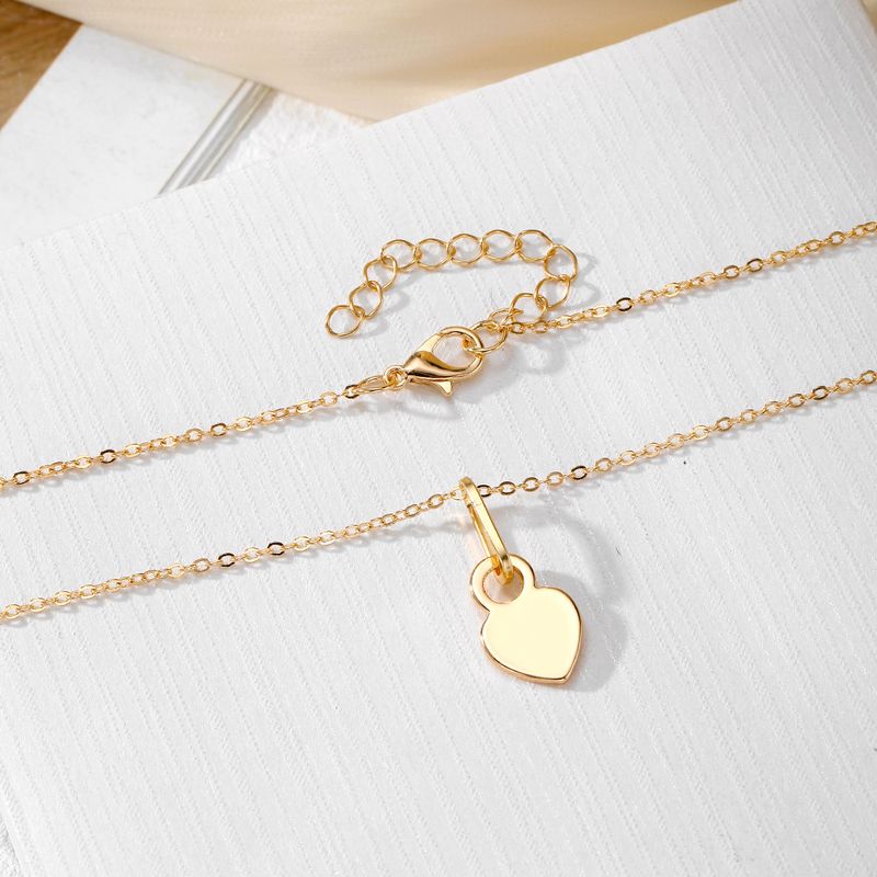 Liebesanhänger Halskette für Frauen hohler Stil hochwertiger Sinn für alle Spielpullover Schlüsselbeinkette Schmuck_voghion.com
