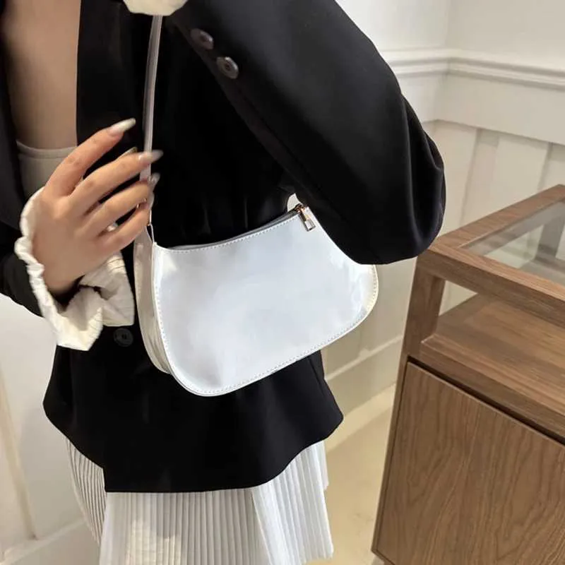 Designer-Tasche Modische Handtasche Retro Einfarbig PU-Leder Schulter Unterarm Casual Womens Designer Obdachlosentasche_voghion.com