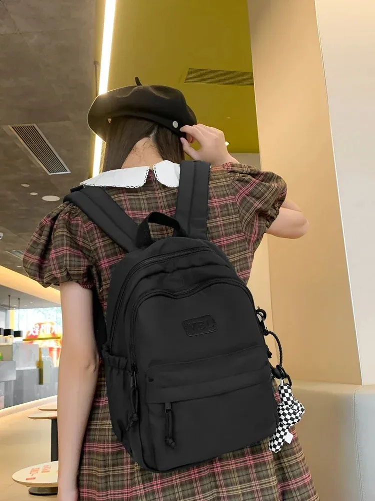 Large capacity casual waterproof nylon backpack fashionable elementary and middle school student bag 240820_voghion.com