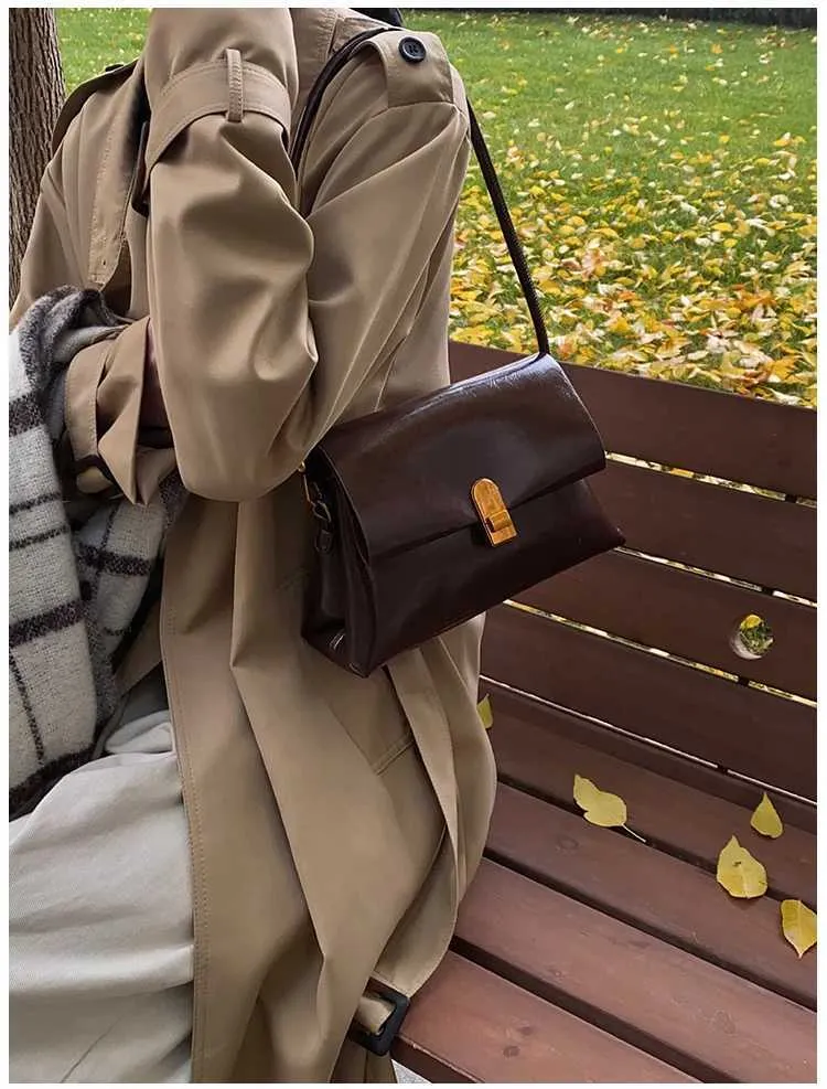 Strukturerad axelremsväska och crossbody väska för damer_voghion.com