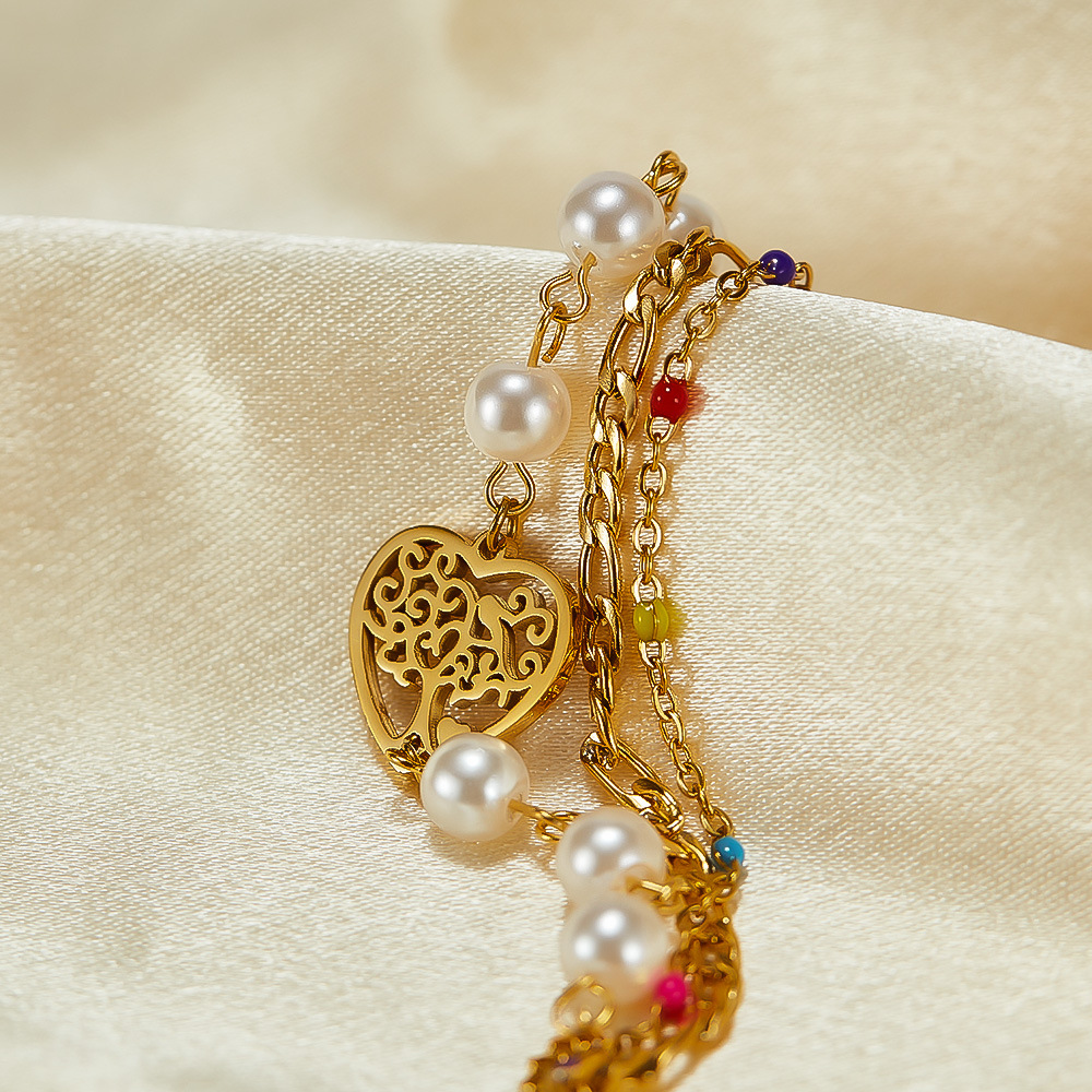 Bracciale a forma di cuore scavato in acciaio inossidabile a doppia catena a tre strati_voghion.com