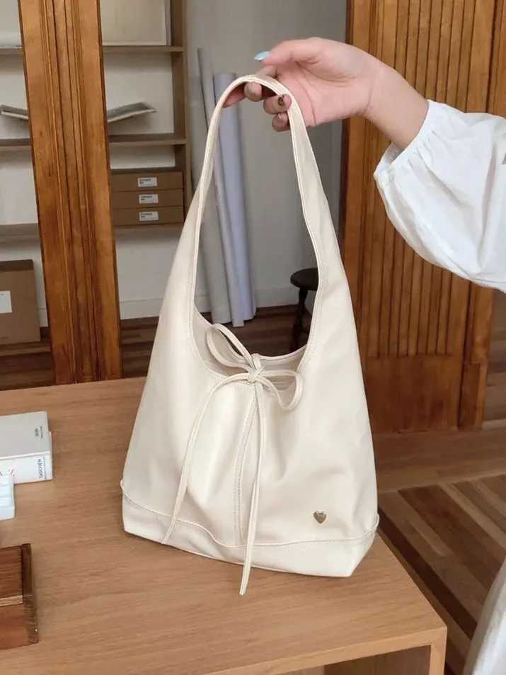 Elegante dames schoudertas en handtas met strik design_voghion.com
