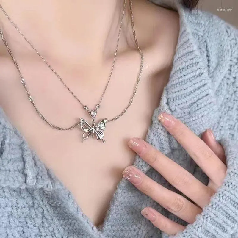Collier avec pendentif en forme de cœur et de papillon en cristal de couleur argent pour femme, chaîne de clavicule à double couche, tendance et tendance_voghion.com