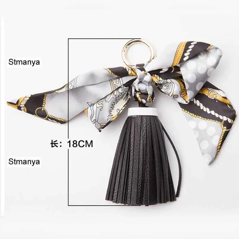 Pingente de lenço com borla de couro macio e fofo, acessório para bolsa, novo chaveiro, porta-chaves de carro da moda K1690 Y241121_voghion.com