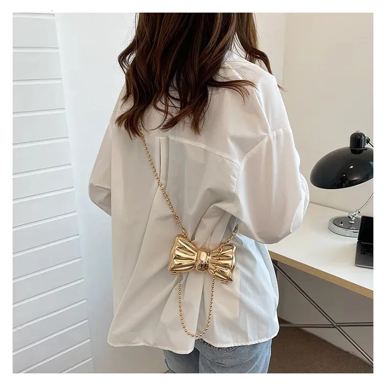 Borsa a mano con catena lunga in oro e argento con fiocco, da sera, da donna, con manico superiore in conchiglia, borse e borsette da festa per matrimonio 241212_voghion.com