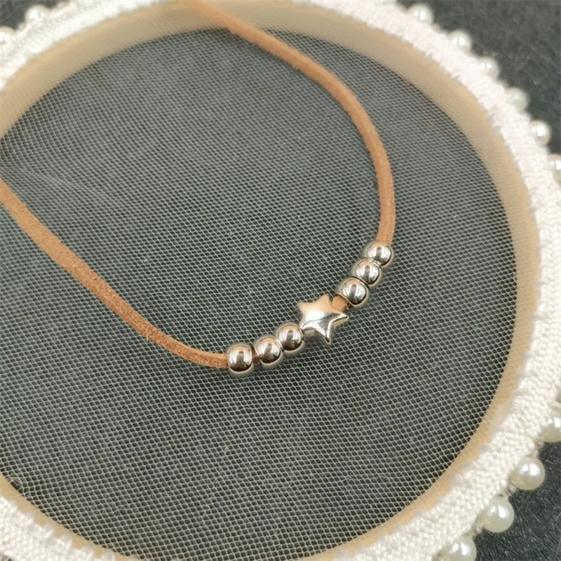 Collana choker stella boho collana pelle nera da donna_voghion.com