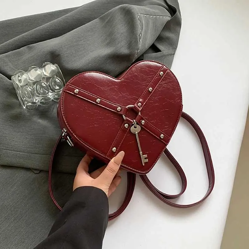 Rucsac mini din piele PU pentru femei, cu pandantiv în formă de inimă, impermeabil, cu fermoar, Ba241217_voghion.com