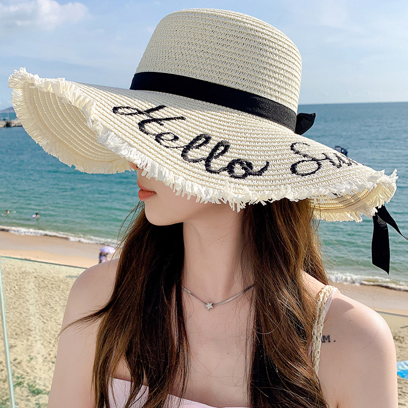 Unisex Summer large embroidered sunblock straw hat women's fashion simple letter bow streamer sun hat sweet sun hat_voghion.com