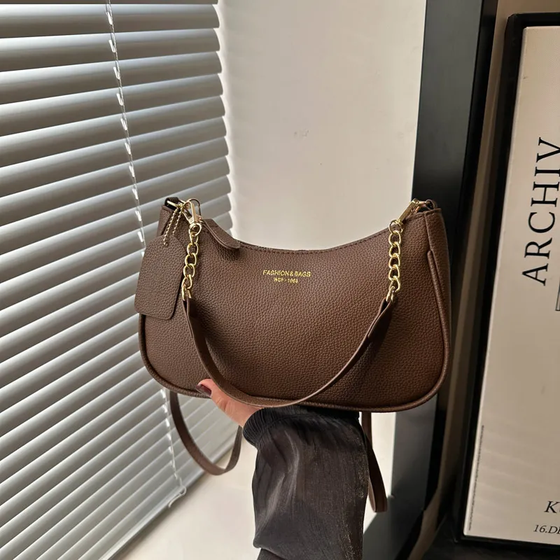 The 2025 Best-selling Single-shoulder Handbag Trendy, Fashionable, Has Unique Underarm Texture, And Is A Niche New Moon_voghion.com