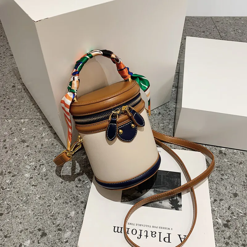 Neue, von einem Nischendesigner entworfene zylindrische Tasche, eine Retro- und modische Umhängetasche für Damen_voghion.com