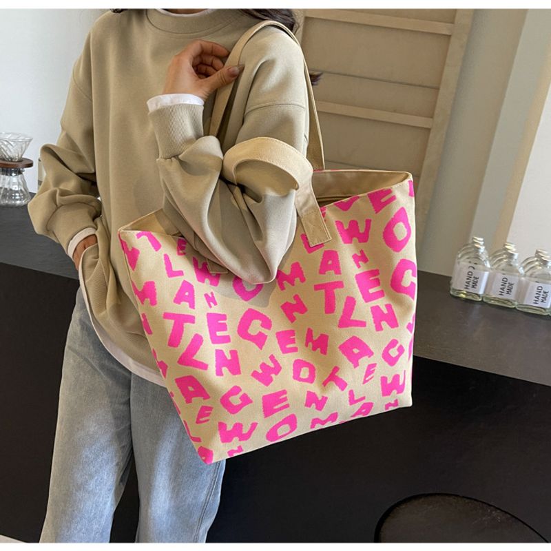 Persönlichkeit bedruckter Buchstabe Mommy Bag 2024 neue Textur Farbkontrast Freizeit Canvas große Kapazität Tote_voghion.com