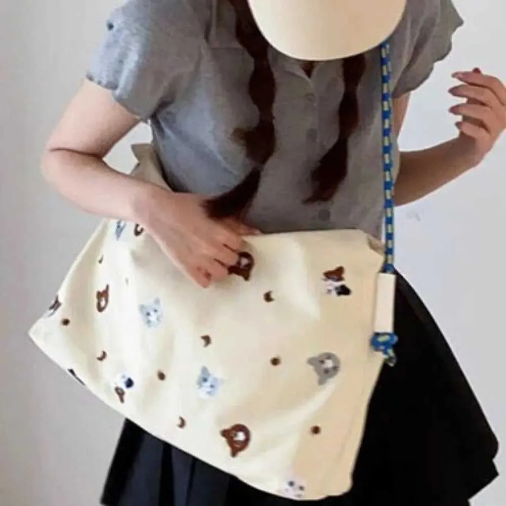 Nouveaux sacs à main de grande capacité pour les courses, sac à bandoulière simple en nylon pour les voyages portables avec dessin animé Ba241214_voghion.com