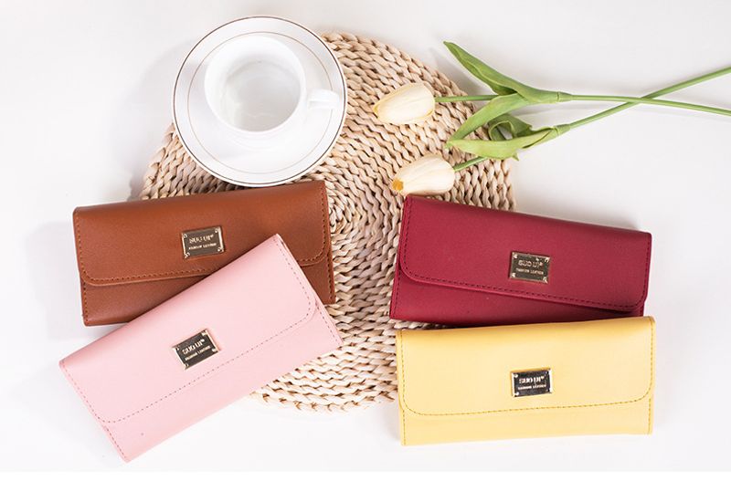 Ensfarget clutch med glidelås og myntlommebok med flere kort, stor seddellomme_voghion.com