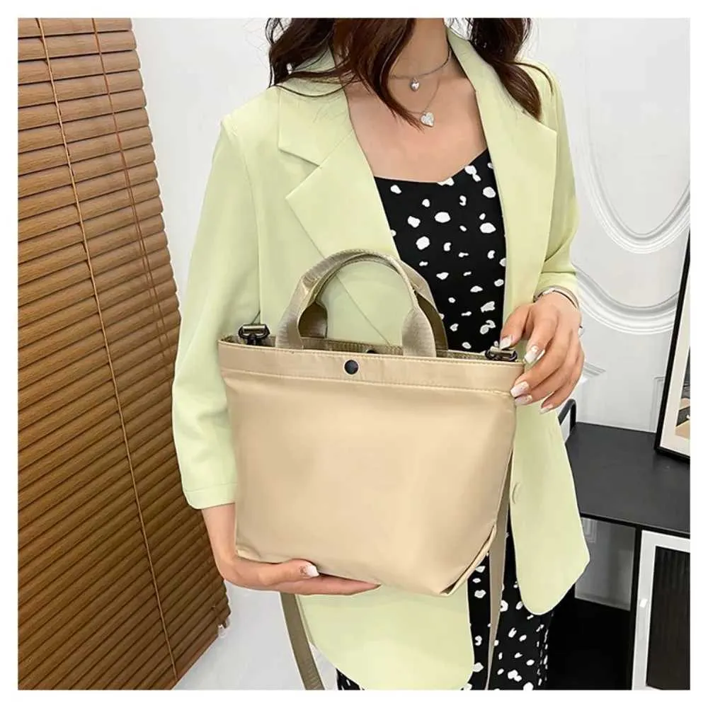 Vintage 2024 Nei Grousskapazitéit Handtasche Damen Nylon Stoff Schëllertasche Koreanesch Einfach PU Crossbody Taschen Dammen_voghion.com