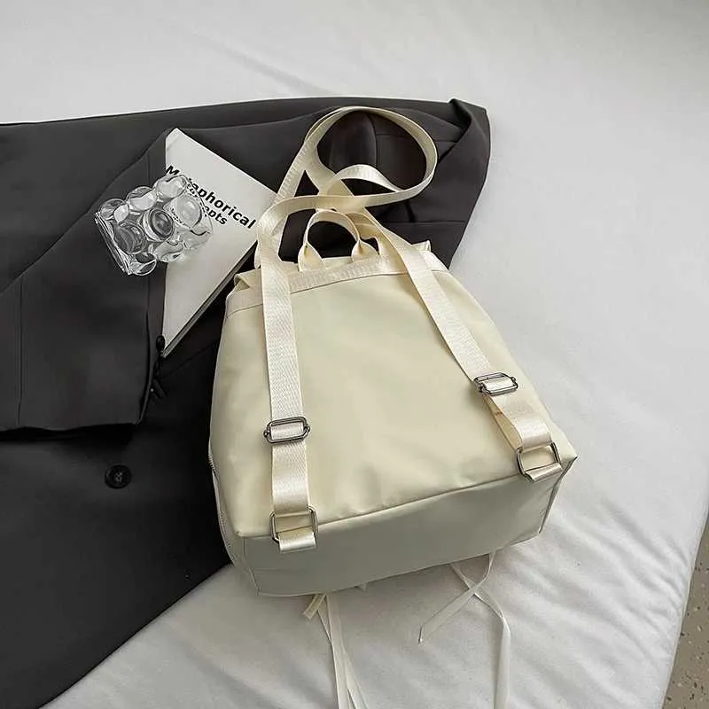 Bogen Design Frauen Kleine Nylon Rucksäcke 2024 Frühling Y2K Koreanische Mode Einfarbig Rucksack Dame Reise_voghion.com