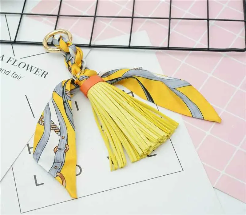Pingente de lenço com borla de couro macio e fofo, acessório para bolsa, novo chaveiro, porta-chaves de carro da moda K1690 Y241121_voghion.com