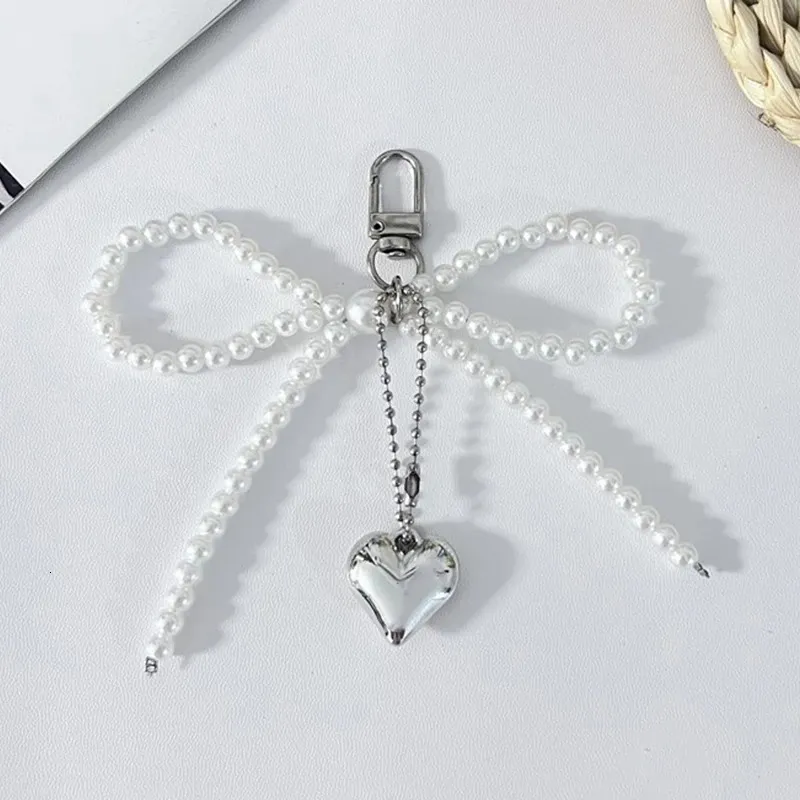 Ins Style Bowknot Perlenkette Dreidimensionale Sier Herz Telefon Anhänger Kopfhörer Fall Charm Tasche Dekor Auto Schlüsselanhänger_voghion.com