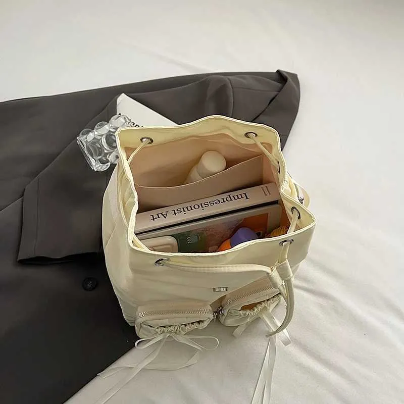 Bogen Design Frauen Kleine Nylon Rucksäcke 2024 Frühling Y2K Koreanische Mode Einfarbig Rucksack Dame Reise_voghion.com