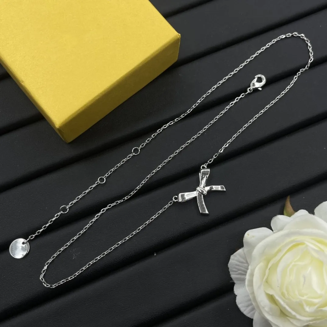 Collana con ciondolo a forma di fiocco in argento dorato con lettera di moda, gioiello da donna, girocollo, regalo per festa di nozze_voghion.com