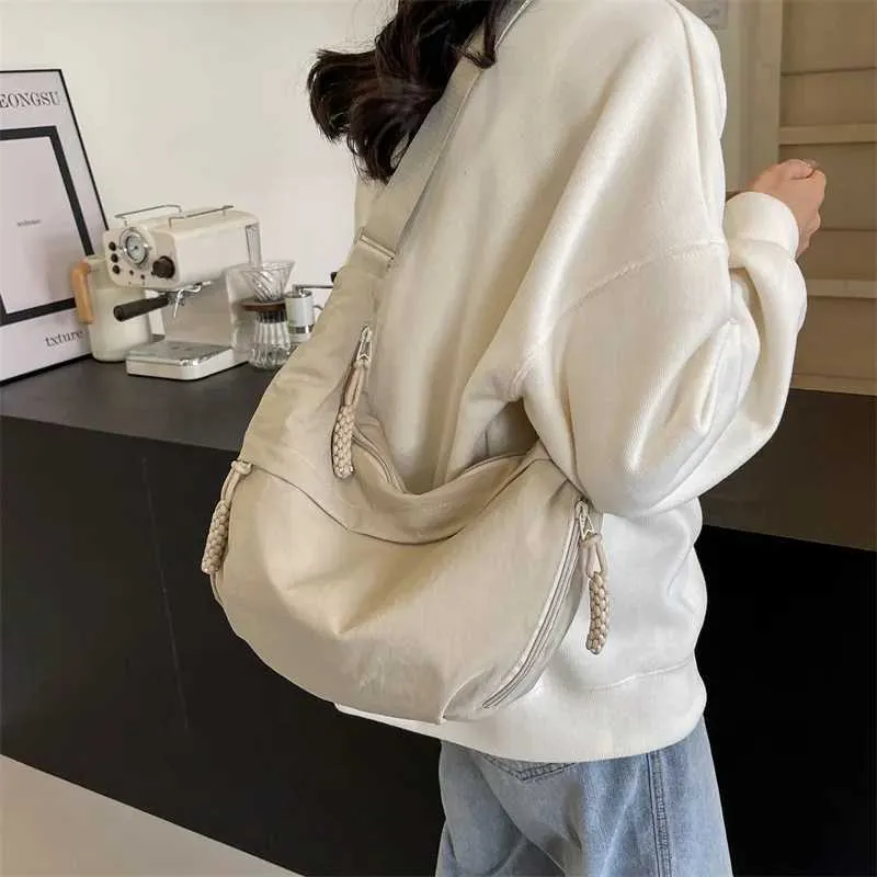 Sac à bandoulière en nylon 2024 pour femme, nouvelle collection été, grande capacité, design polyvalent et de niche, messager Ba241103_voghion.com