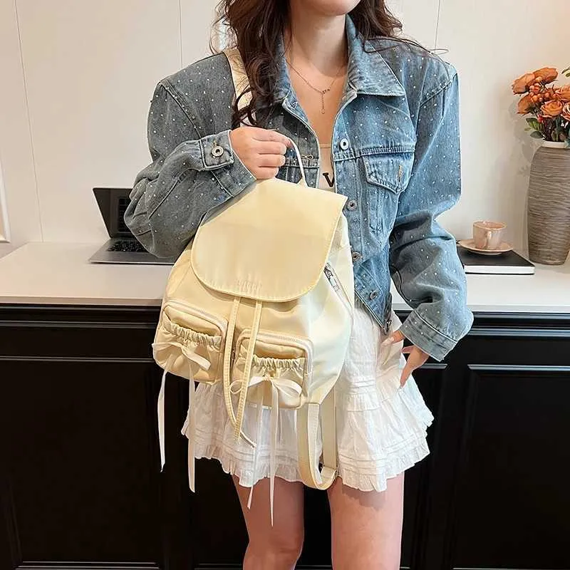 Bogen Design Frauen Kleine Nylon Rucksäcke 2024 Frühling Y2K Koreanische Mode Einfarbig Rucksack Dame Reise_voghion.com