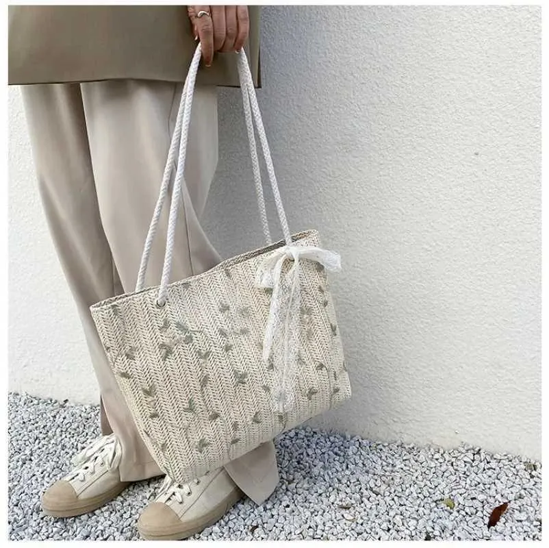 2024 New Summer Wenfei Woven Fem All Mah Portable Bucket Designer Handbag Picnic Bag Y241109_voghion.com
