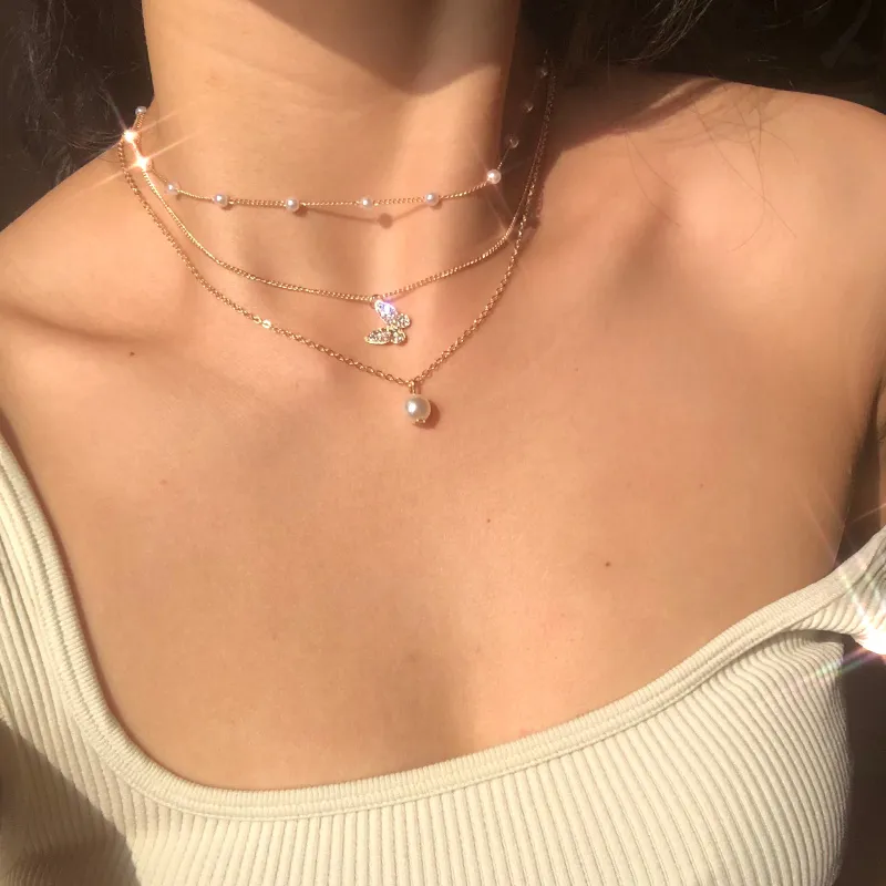 Collana multistrato vintage oro con pendente per donna_voghion.com