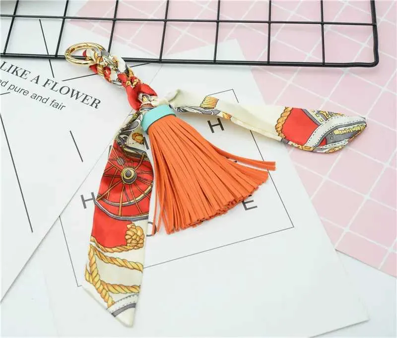 Pingente de lenço com borla de couro macio e fofo, acessório para bolsa, novo chaveiro, porta-chaves de carro da moda K1690 Y241121_voghion.com
