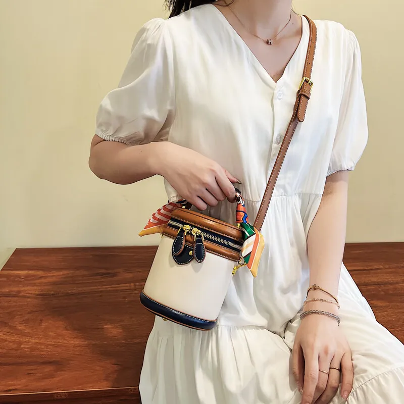 Neue, von einem Nischendesigner entworfene zylindrische Tasche, eine Retro- und modische Umhängetasche für Damen_voghion.com
