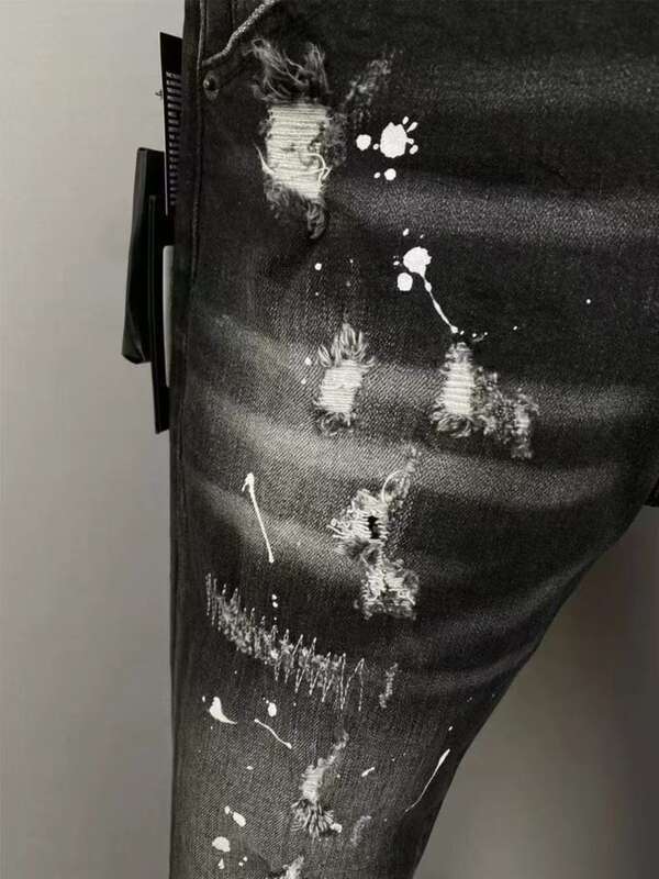 2025 Black Washed Distressed Patch Versatile Paint Street Slimming Micro Elastic Jeans_voghion.com