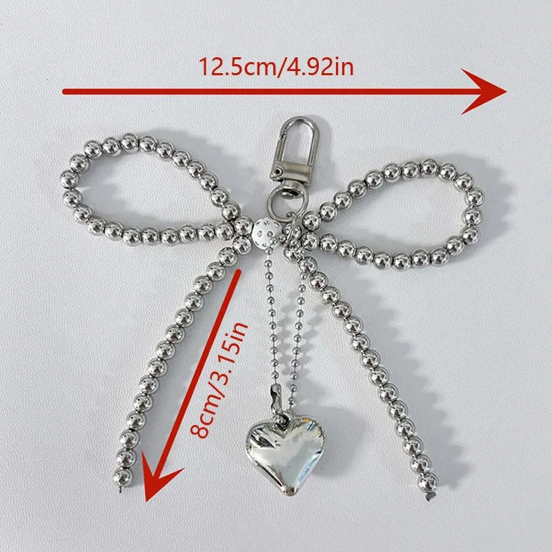 Ins Style Bowknot Perlenkette Dreidimensionale Sier Herz Telefon Anhänger Kopfhörer Fall Charm Tasche Dekor Auto Schlüsselanhänger_voghion.com