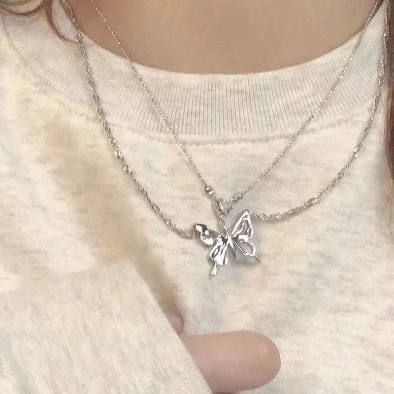 Collier avec pendentif en forme de cœur et de papillon en cristal de couleur argent pour femme, chaîne de clavicule à double couche, tendance et tendance_voghion.com