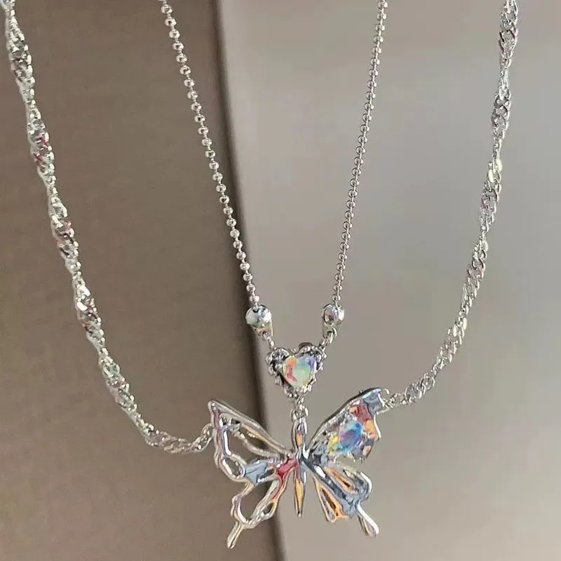 Collier avec pendentif en forme de cœur et de papillon en cristal de couleur argent pour femme, chaîne de clavicule à double couche, tendance et tendance_voghion.com