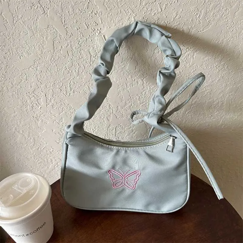 Tikand Bowknot Shoder Bag Y2k stiilis volangidega käepide Nyl Bow meigipulga kott käekott Y241026_voghion.com
