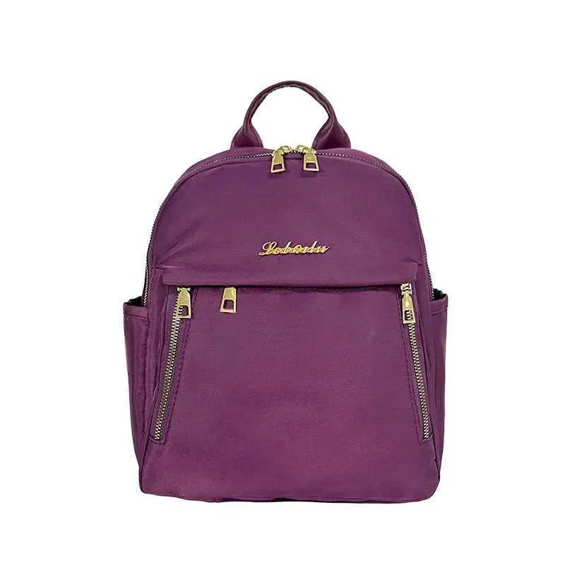 Sac à dos tendance en nylon imperméable à fermeture éclair de grande capacité avec filetage 2024 Hot Selg Sac polyvalent pour femme Mochila Mujer Y241116_voghion.com