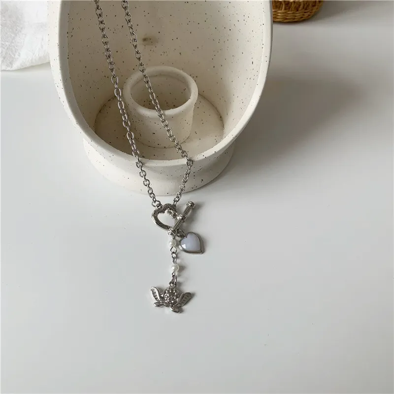 Collana con pendente a cuore e angelo da donna con strass e chiusura_voghion.com