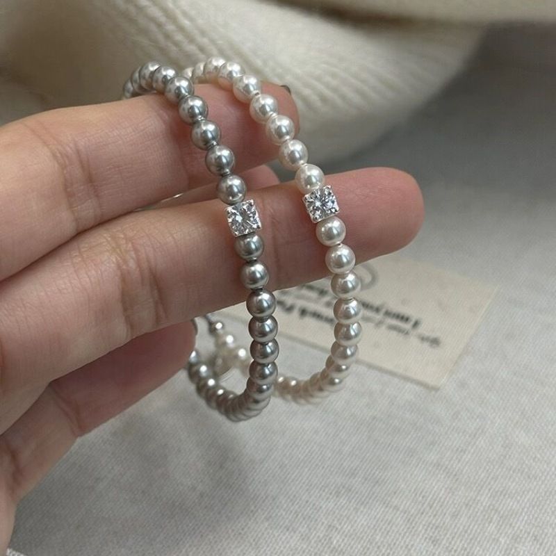 Piccolo squisito cubo di zucchero in zircone Shijia perla elastico leggero elegante braccialetto francese gioielli per ragazze all'ingrosso_voghion.com