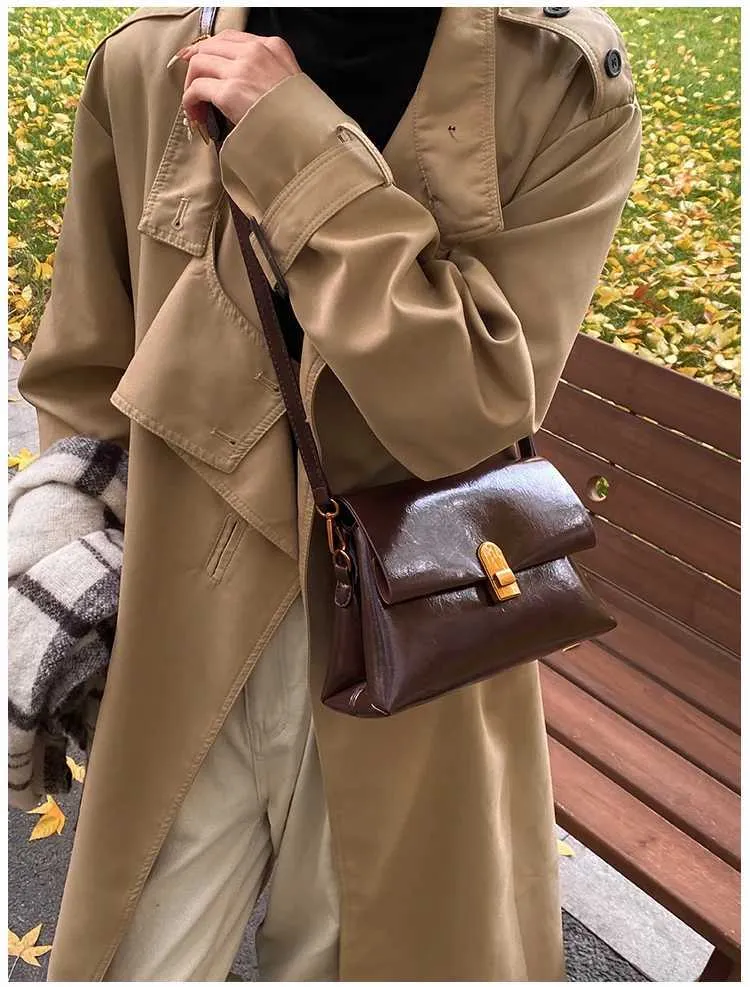 Strukturerad axelremsväska och crossbody väska för damer_voghion.com