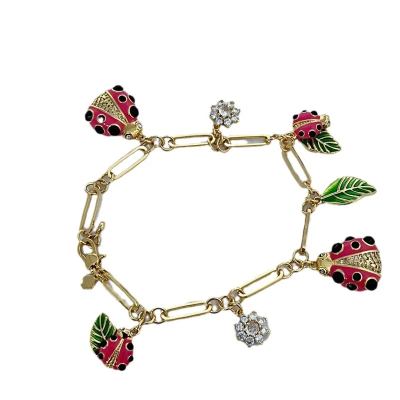 Ladybug Charm Bracelet With Pink Enamel And Zircon Flower Details_voghion.com