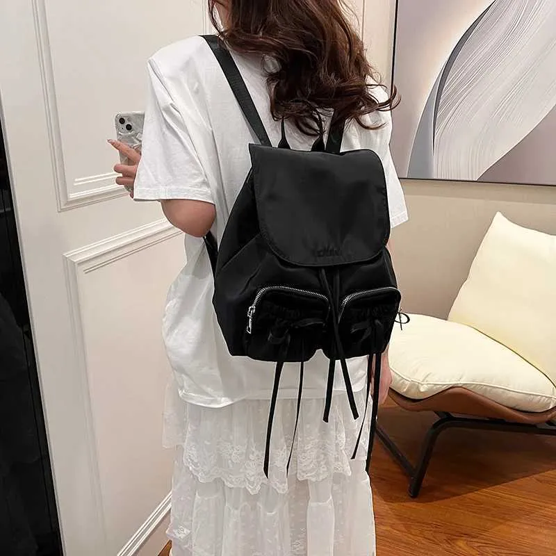 Bogen Design Frauen Kleine Nylon Rucksäcke 2024 Frühling Y2K Koreanische Mode Einfarbig Rucksack Dame Reise_voghion.com
