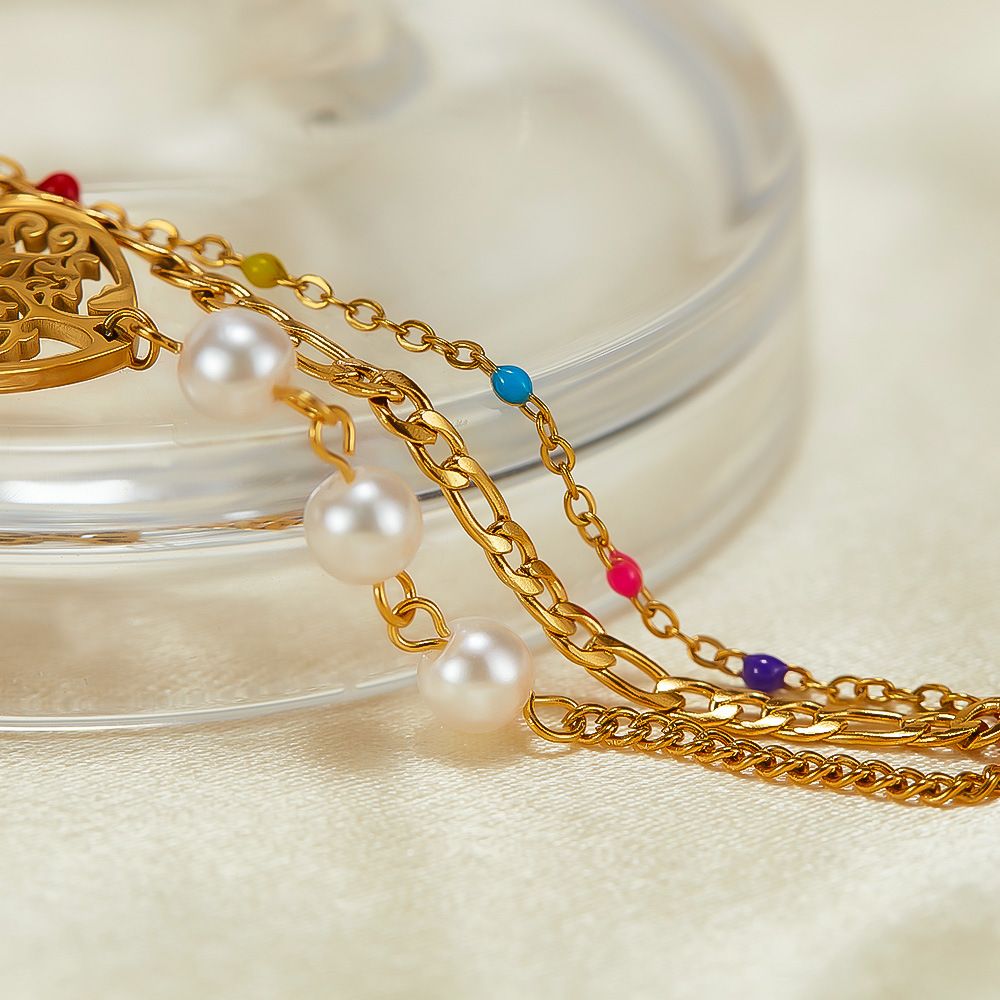 Bracciale a forma di cuore scavato in acciaio inossidabile a doppia catena a tre strati_voghion.com