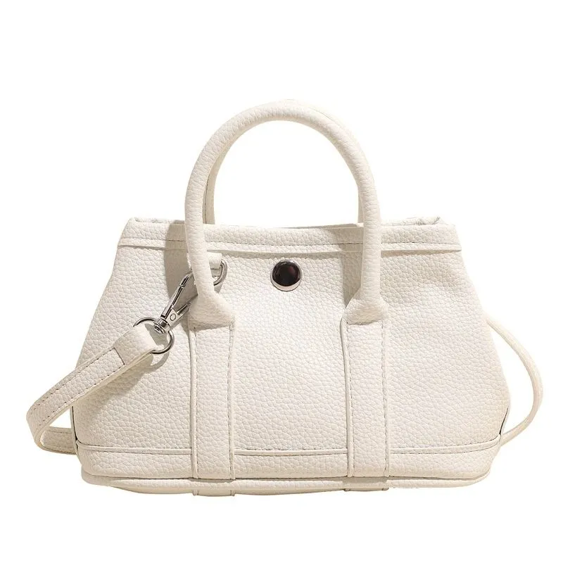 Free Shipping 2025 New Designer Fashion Commuter Litchi Pattern Women's Handheld Single Shoulder Diagonal Cross Trendy_voghion.com