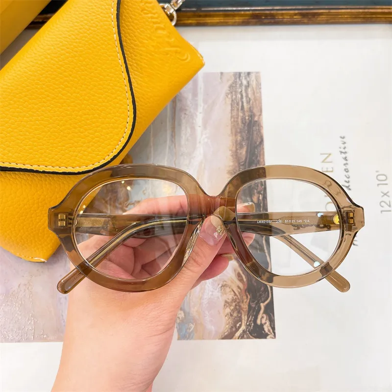 designer of Women and eyewear Summer Outdoor Fashion Style Beach Glasses Sports Flying men Sunglasses LW 40105F_voghion.com
