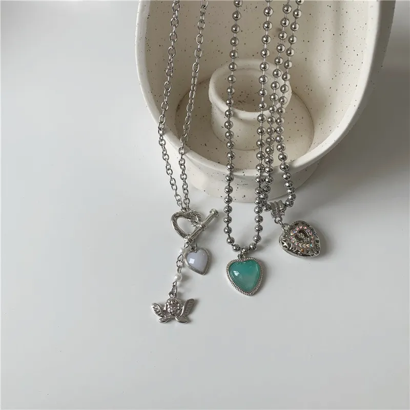 Collana con pendente a cuore e angelo da donna con strass e chiusura_voghion.com