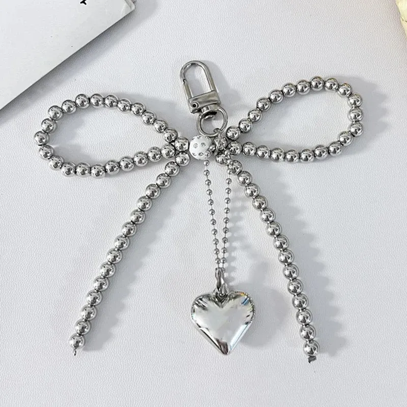 Ins Style Bowknot Perlenkette Dreidimensionale Sier Herz Telefon Anhänger Kopfhörer Fall Charm Tasche Dekor Auto Schlüsselanhänger_voghion.com