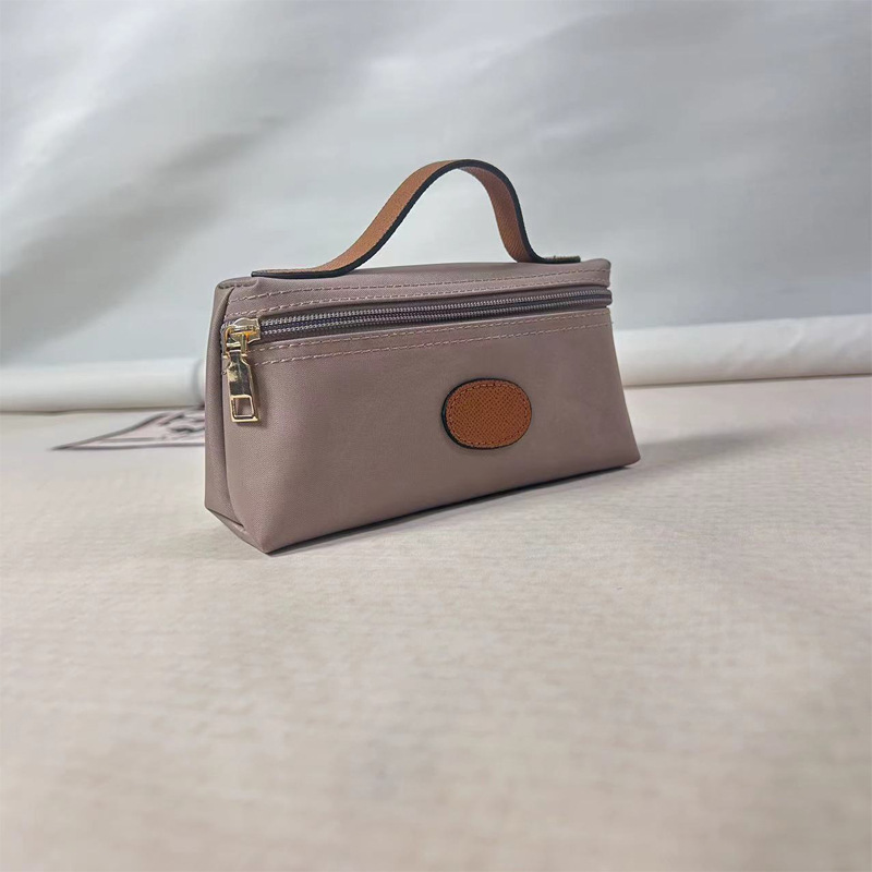 2024 nuova mini borsa per cosmetici portatile alla moda, portamonete per gnocchi alla moda, in nylon femminile, impermeabile e leggero_voghion.com