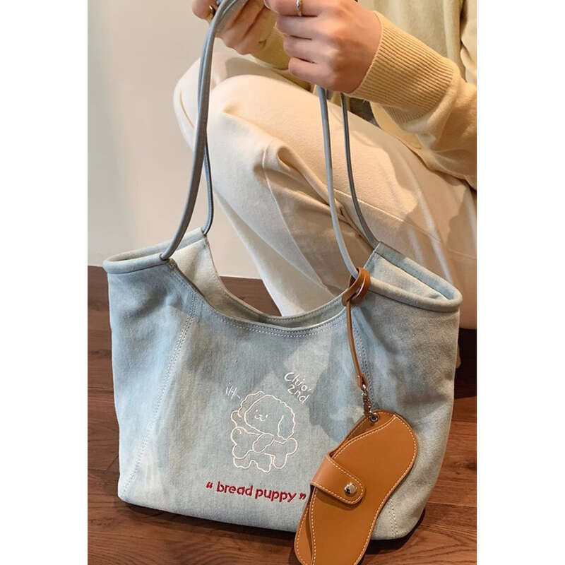 Borsa a mano da pendolare di grande capacità da donna_voghion.com
