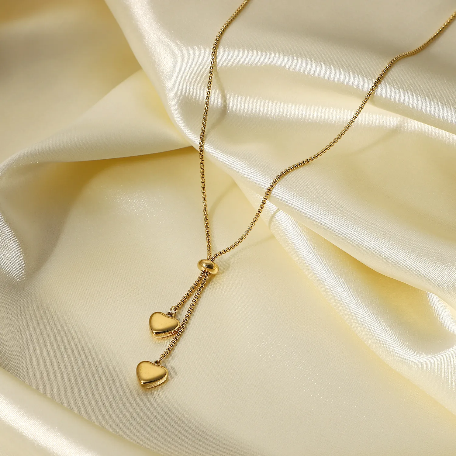 Collana alla moda in acciaio al titanio per donna, placcata in oro 14K, con catena a forma di Y e ciondolo a forma di due cuori_voghion.com