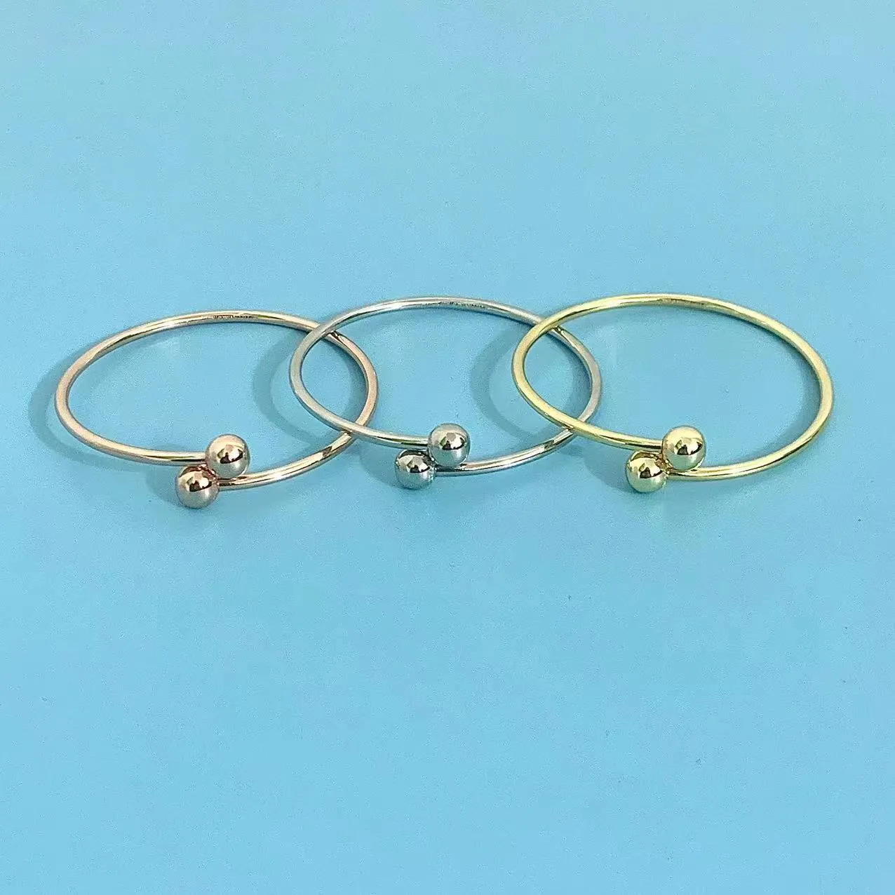 Bracciale rigido lotus elegante da donna placcato oro e argento_voghion.com